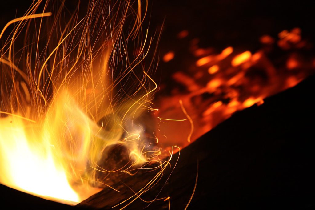 Picture of fire burning representing energy and utilities
